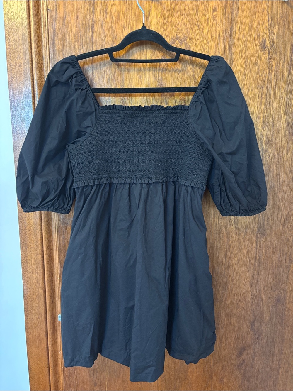 Puff sleeved black dress